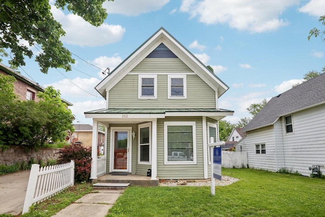 view of front of home with a front yard