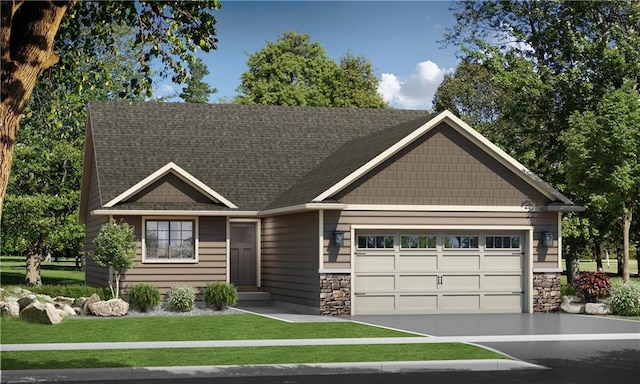 view of front of home with a garage and a front lawn