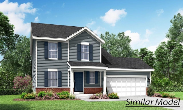 view of front of home featuring a front yard and a garage