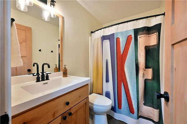 bathroom featuring toilet and oversized vanity