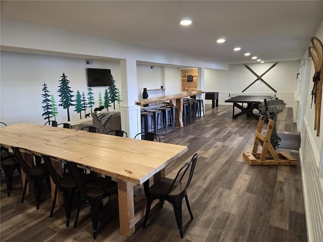 dining area featuring dark hardwood / wood-style flooring