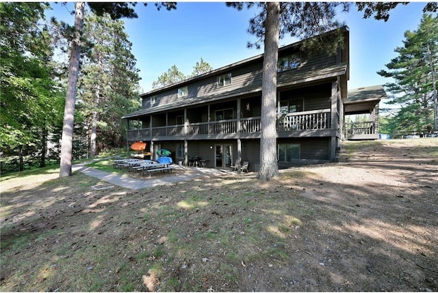 back of house with a patio area