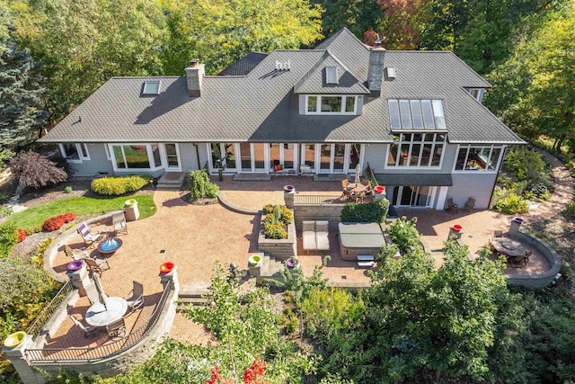 back of house featuring a patio