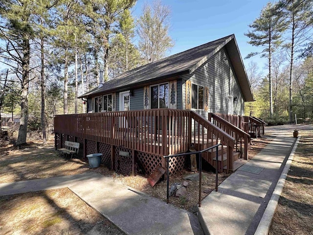 view of front facade featuring a wooden deck