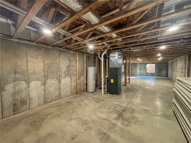 basement featuring water heater and heating unit