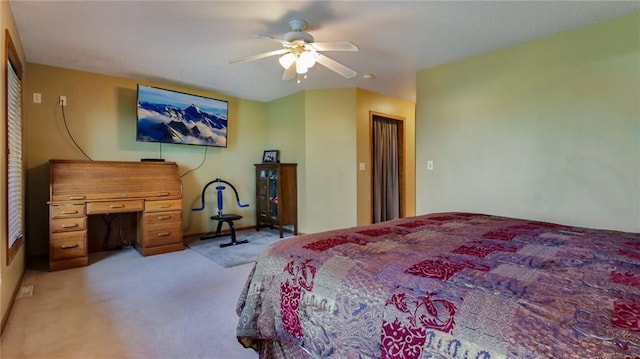 bedroom with light colored carpet and ceiling fan