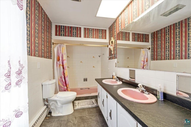 bathroom featuring a baseboard radiator, vanity, tile walls, toilet, and a shower with shower curtain