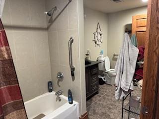 full bathroom featuring shower / bath combo, toilet, tile flooring, and vanity