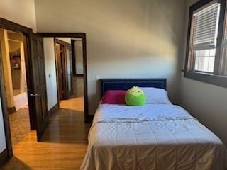 bedroom featuring hardwood / wood-style flooring