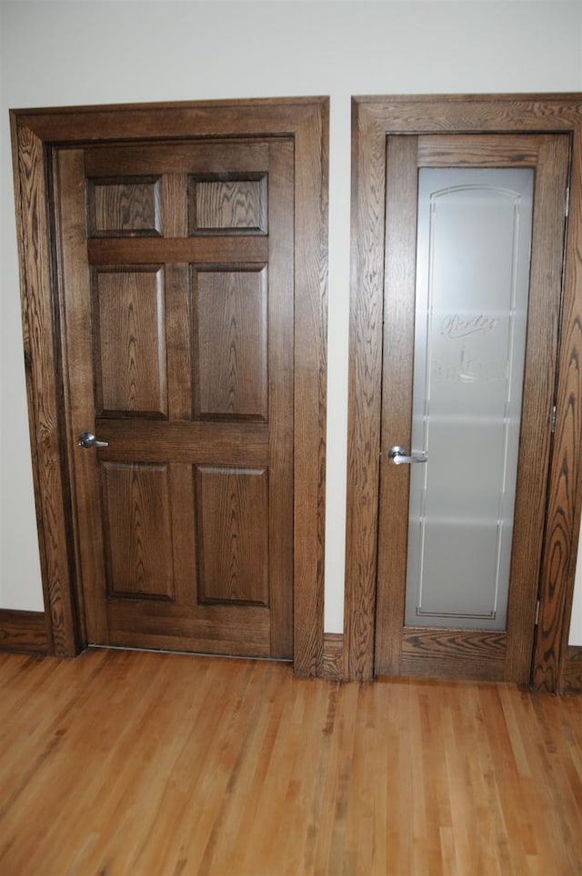 interior details featuring light hardwood / wood-style floors