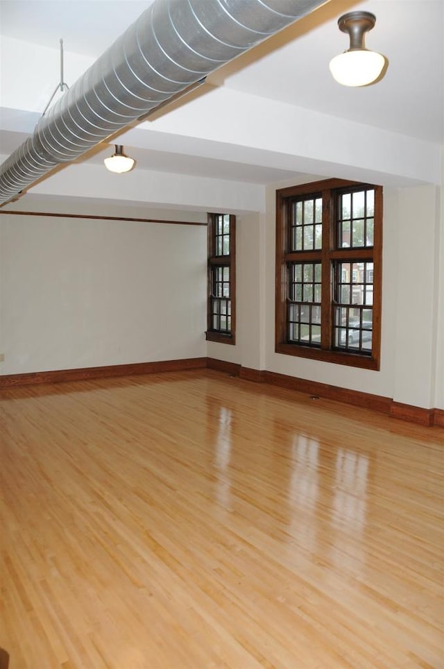 spare room featuring light hardwood / wood-style flooring