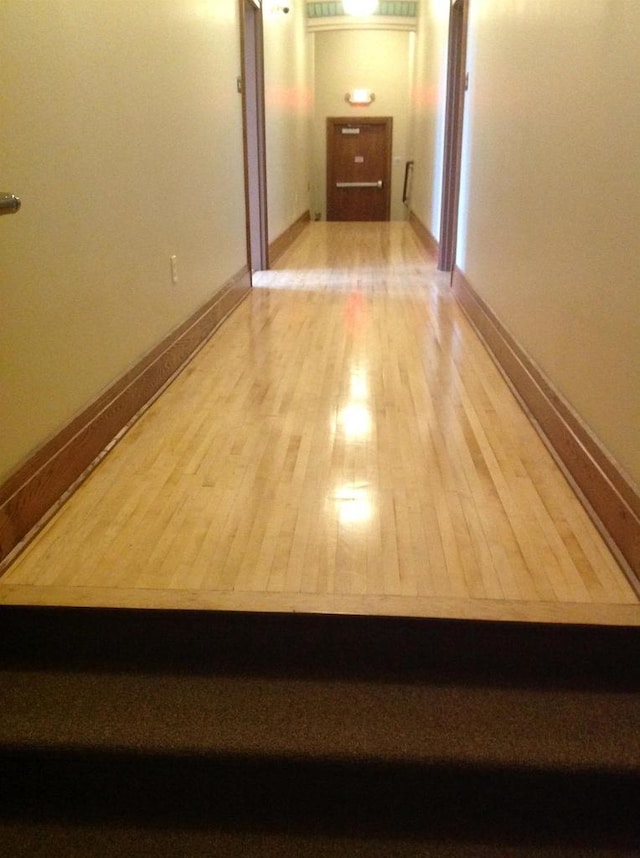 corridor featuring light hardwood / wood-style flooring