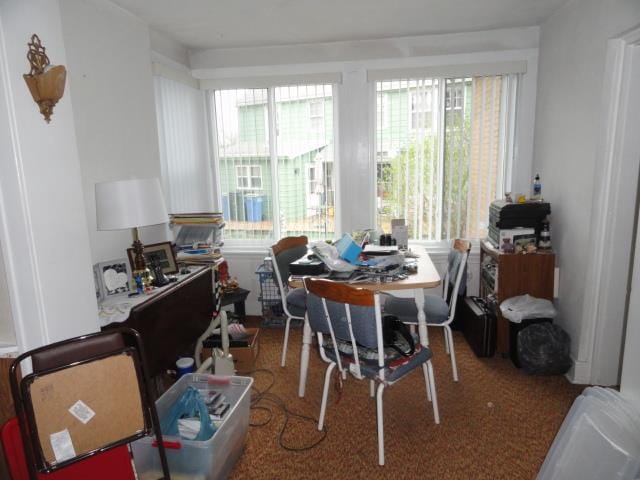 dining area featuring a healthy amount of sunlight