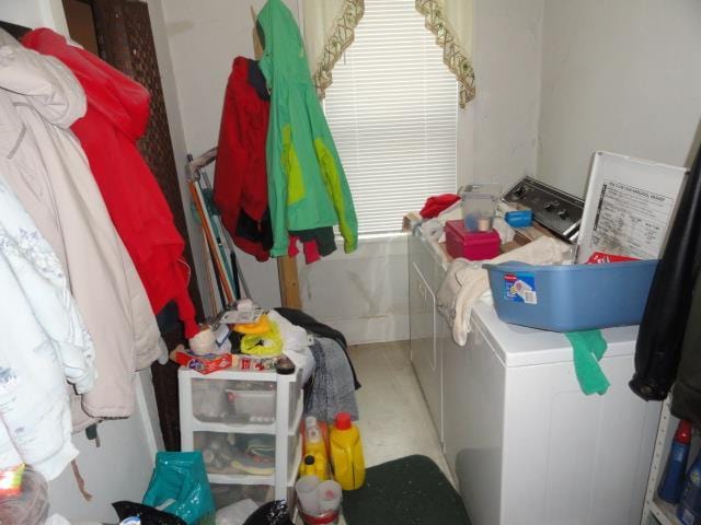 laundry area featuring washing machine and clothes dryer