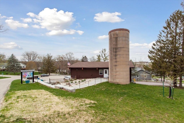 exterior space with a yard