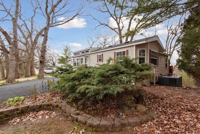 view of front of property featuring central AC unit