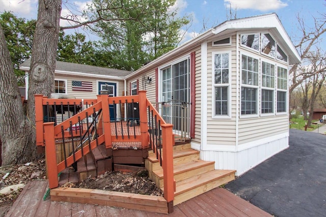 exterior space featuring a wooden deck