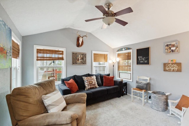 living room featuring light colored carpet, lofted ceiling, and ceiling fan