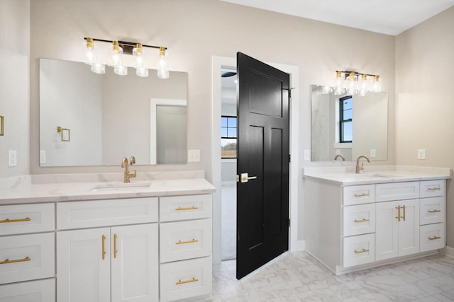 bathroom with plenty of natural light, tile floors, and dual vanity