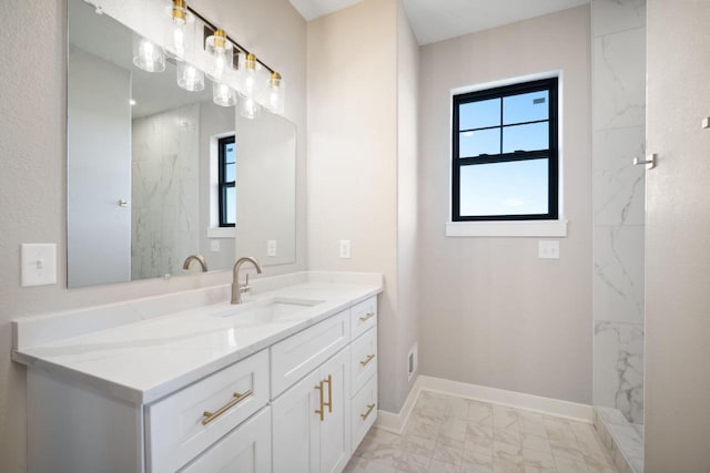 bathroom with vanity and tile flooring