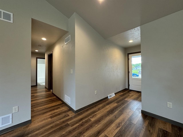 empty room featuring dark hardwood / wood-style floors