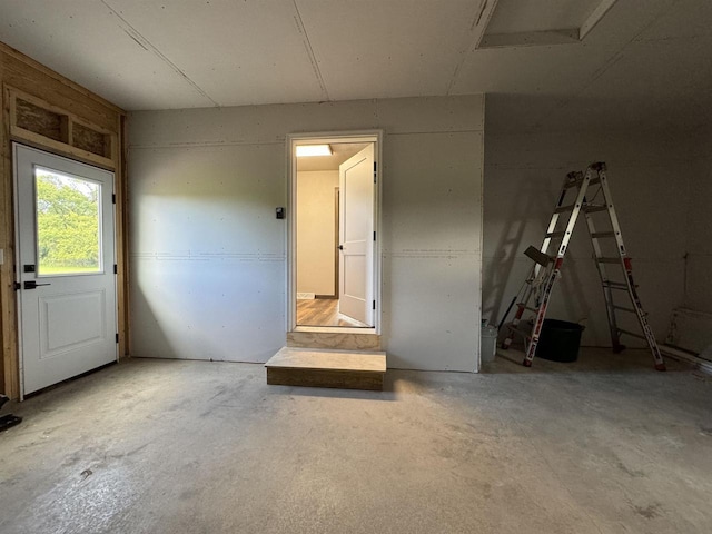 interior space featuring concrete flooring