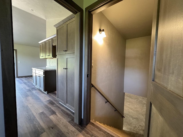 corridor with dark hardwood / wood-style floors