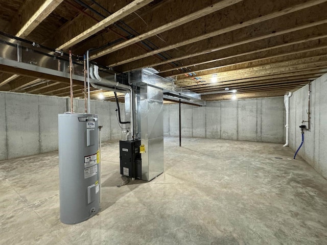 basement with heating unit and electric water heater