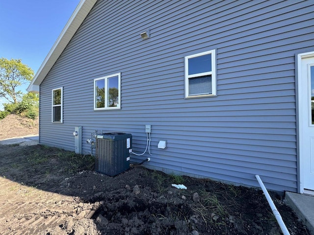 view of home's exterior featuring central AC