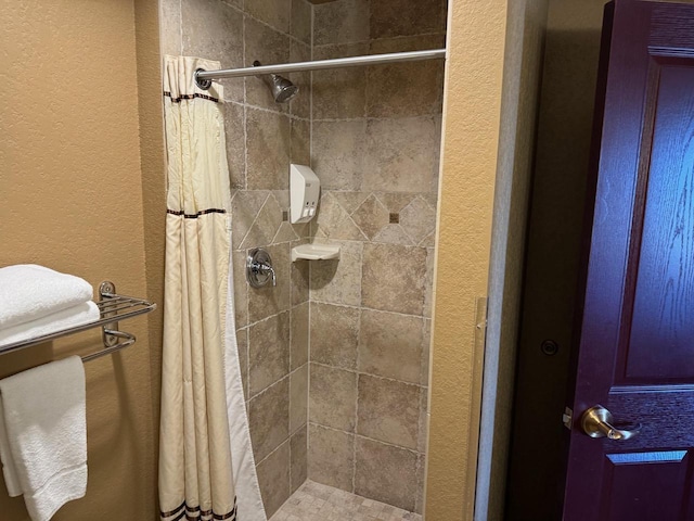 bathroom with curtained shower