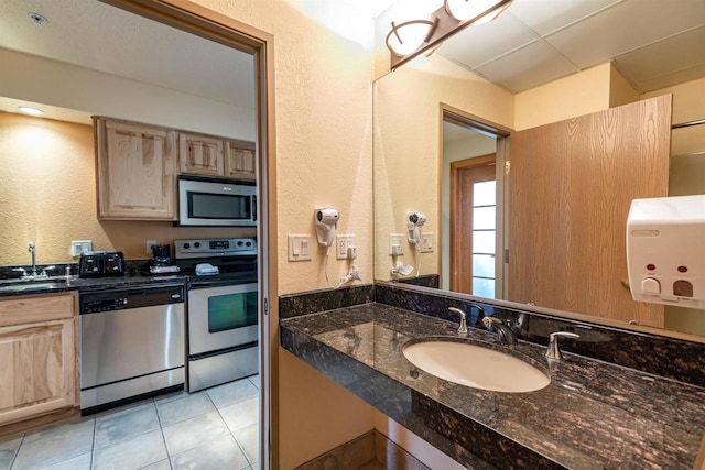 interior space featuring tile flooring and sink