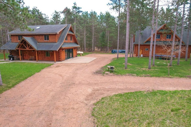 exterior space featuring a front yard