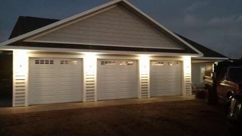 view of garage at night