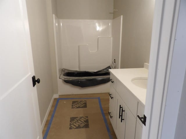 bathroom with vanity and walk in shower