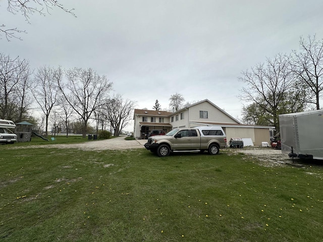 view of yard featuring a garage