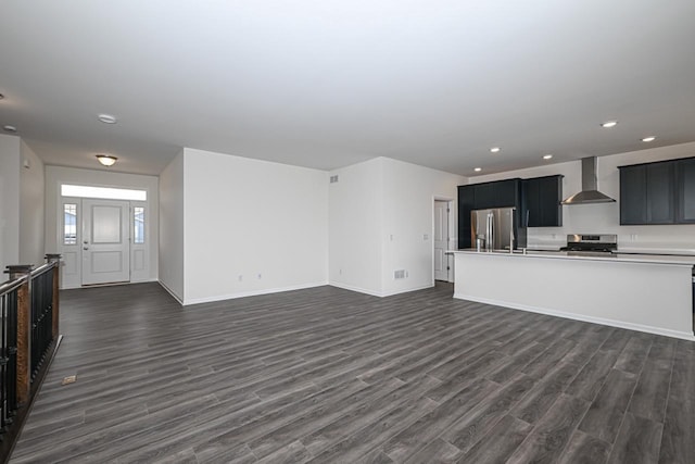 unfurnished living room featuring dark hardwood / wood-style flooring