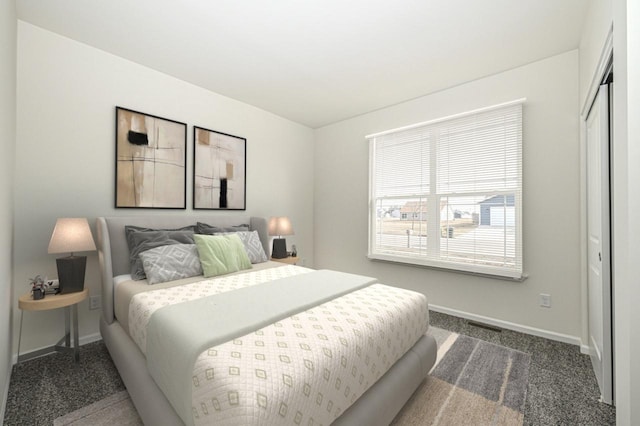 carpeted bedroom featuring a closet