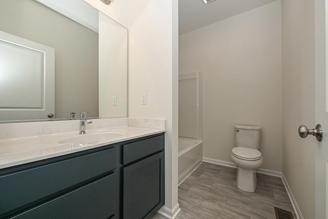 full bathroom featuring shower / bath combination, toilet, tile floors, and vanity