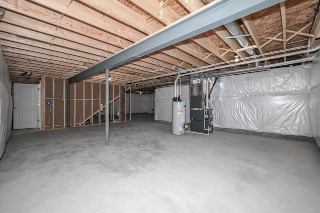 basement featuring water heater and heating utilities