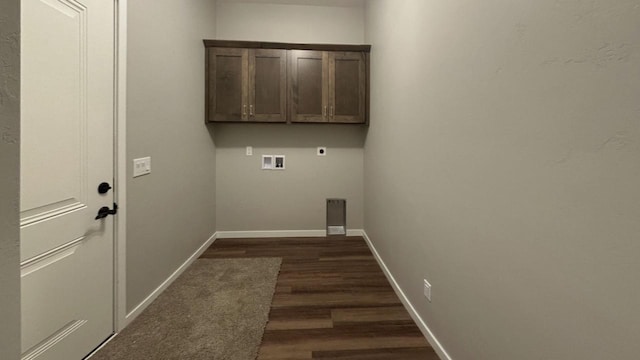 laundry area with cabinets, dark hardwood / wood-style floors, washer hookup, and electric dryer hookup