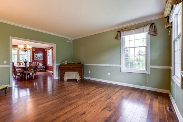 3310 Saracen Way, Verona, WI 53593 - empty room featuring a chandelier, wood finished floors, and crown molding