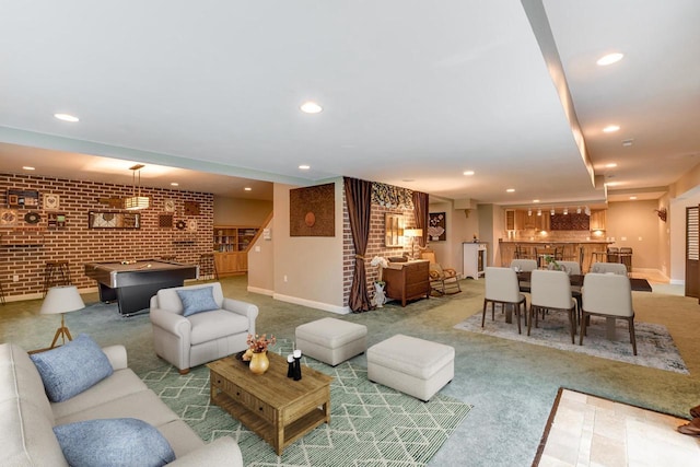 3310 Saracen Way, Verona, WI 53593 - carpeted living room with brick wall, stairway, bar area, and recessed lighting