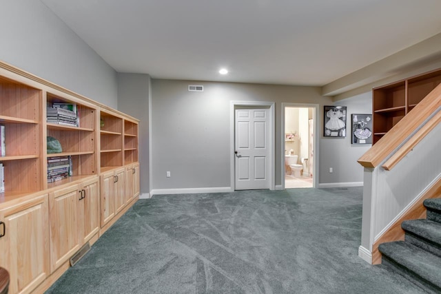 3310 Saracen Way, Verona, WI 53593 - unfurnished living room with dark carpet, stairs, and recessed lighting