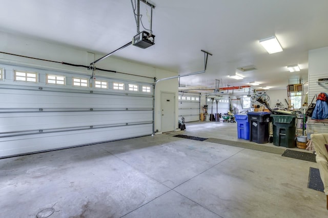 3310 Saracen Way, Verona, WI 53593 - garage featuring a garage door opener