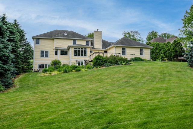 3310 Saracen Way, Verona, WI 53593 - back of property with a chimney, a yard, and a deck
