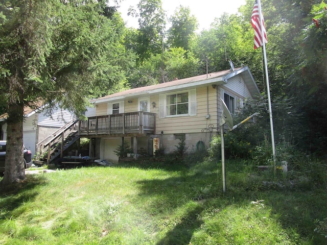 exterior space featuring a wooden deck and a yard