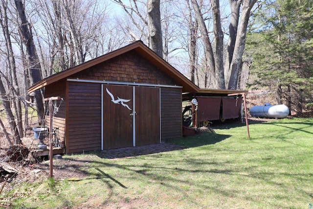 view of outdoor structure with a yard