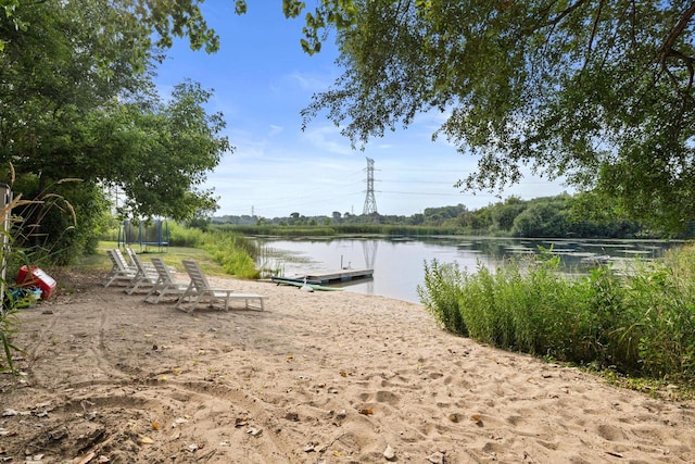 property view of water featuring a boat dock