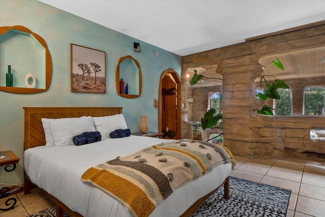 tiled bedroom with wooden walls