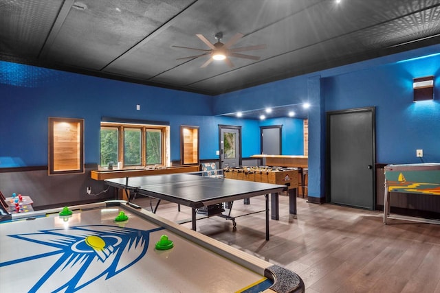 playroom featuring hardwood / wood-style floors and ceiling fan